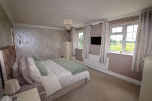 Bedroom One- click for photo gallery